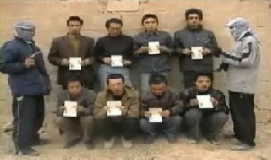 site_institute-al-nuhman_brigades_video_statement_about_8_chinese_prisoners